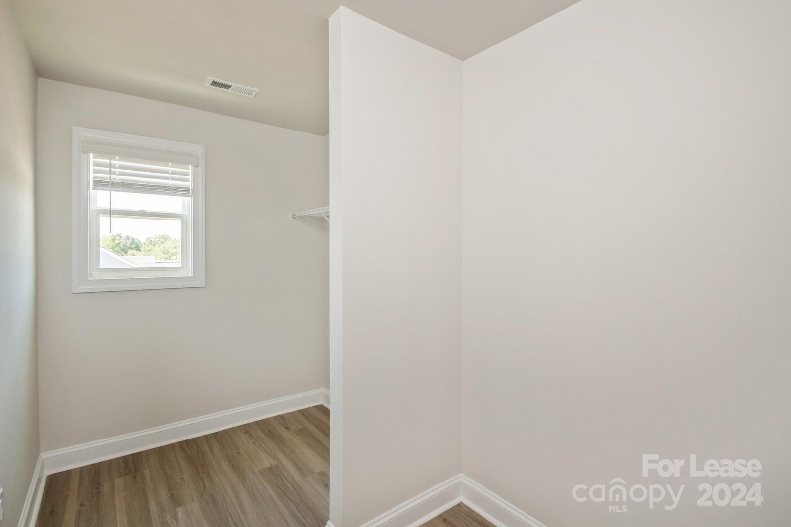 211 Adams Tree Way Troutman, NC 28166 - Photo 25 of 32 a view of an empty room with a window