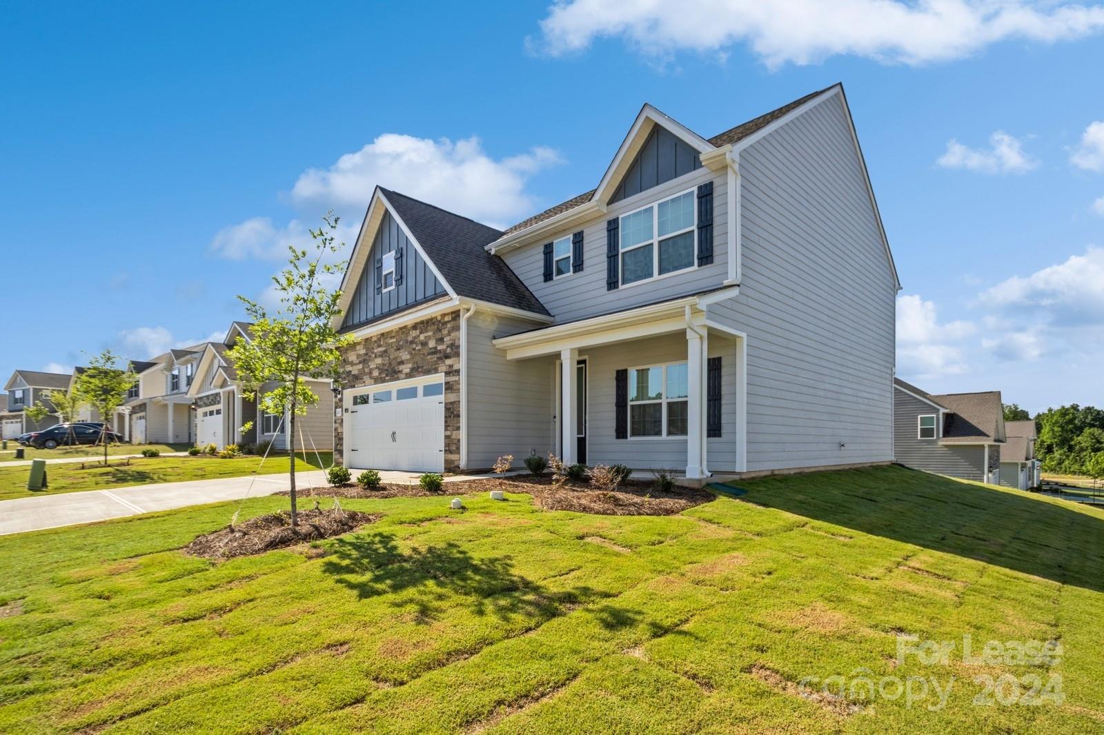 211 Adams Tree Way Troutman, NC 28166 - Photo 27 of 32 a view of a house with a swimming pool
