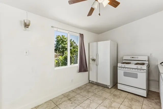 a view of a kitchen with washer and dryer