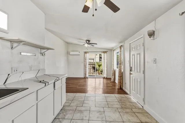 a hallway with a large entryway