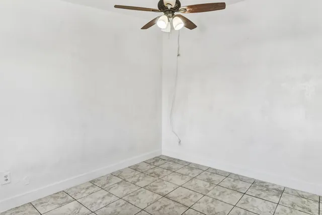 a view of a room with white walls