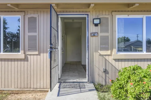 front view of a house with a glass door