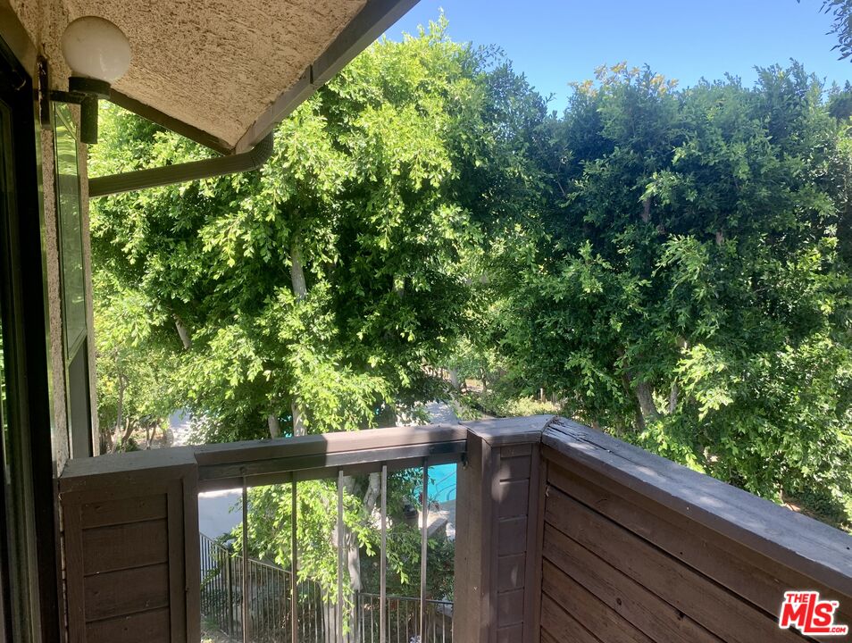 7312 Corbin Avenue, Unit M Reseda, CA 91335 - Photo 13 of 18 a view of balcony with wooden floor