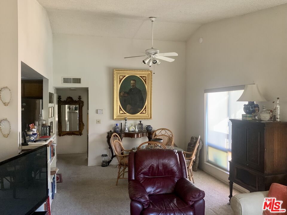 7312 Corbin Avenue, Unit M Reseda, CA 91335 - Photo 2 of 18 a view of a livingroom with furniture and a window