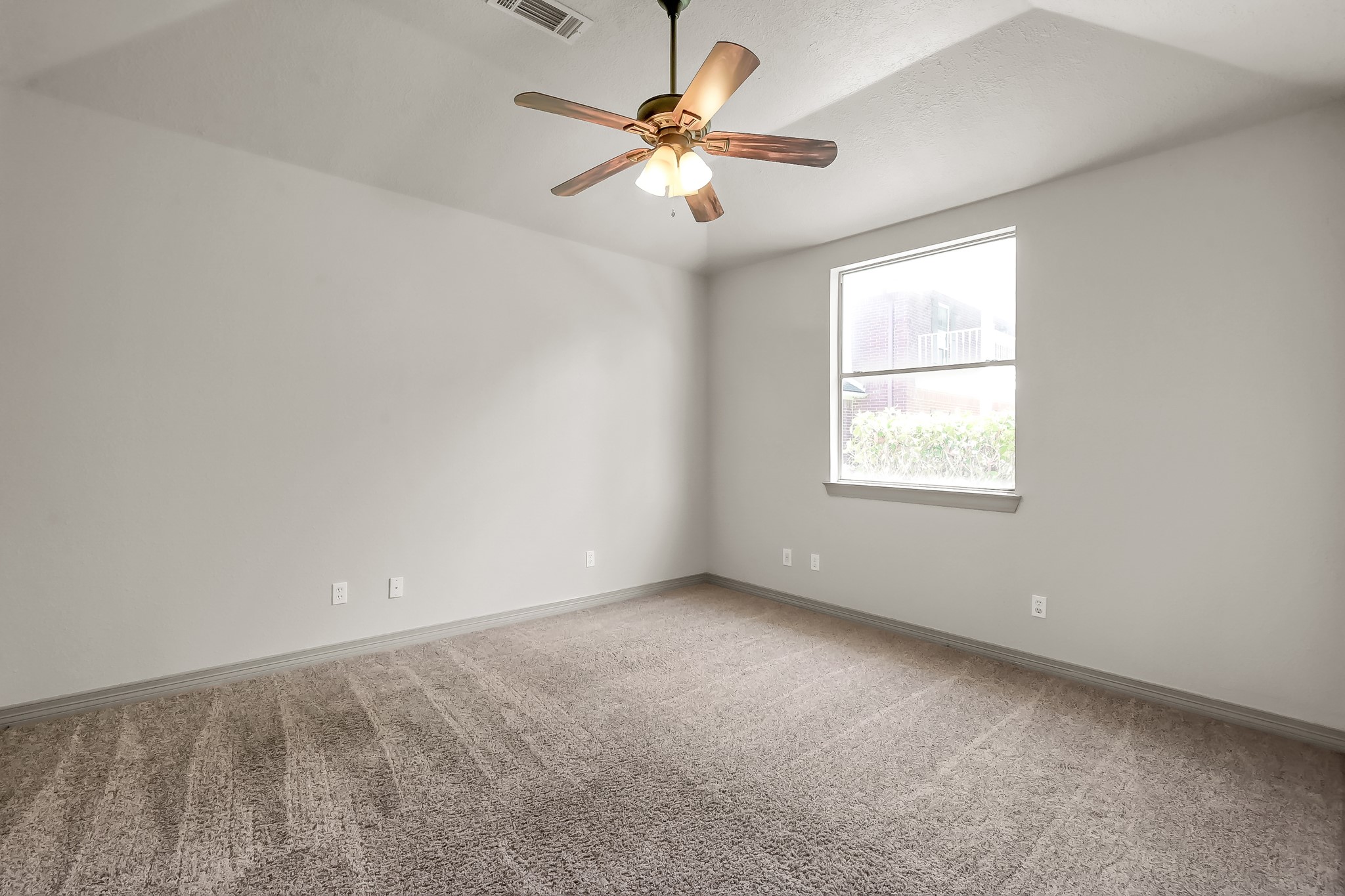 12758 Aries Loop Willis, TX 77318 - Photo 21 of 48 Second Bedroom