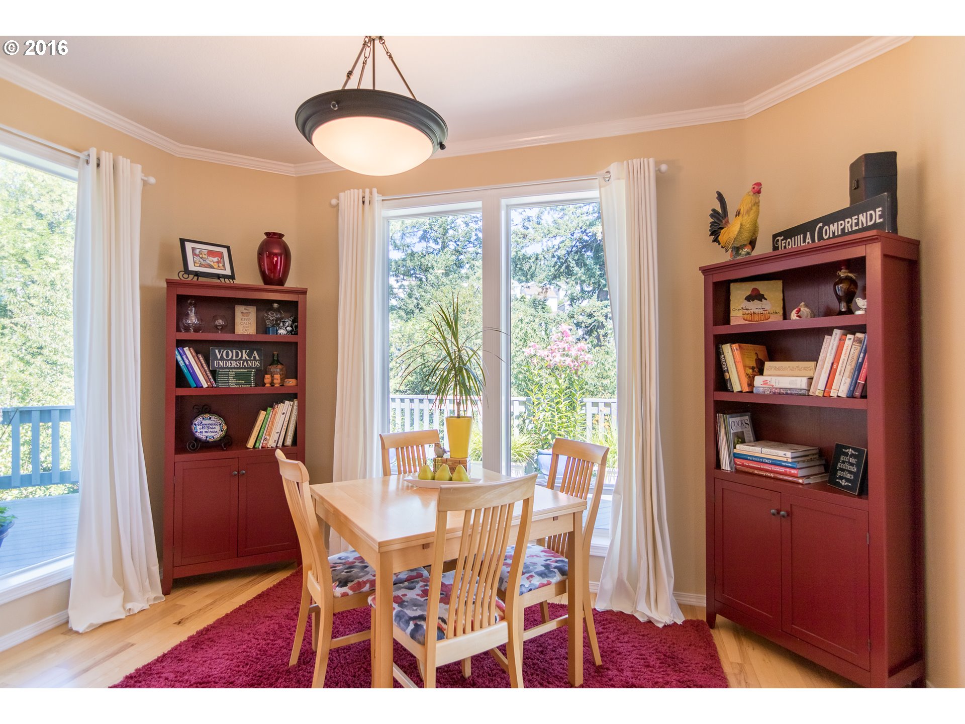 15806 Southwest Colyer Way Tigard, OR 97224 - Photo 13 of 32 a view of a dining room with furniture and a window