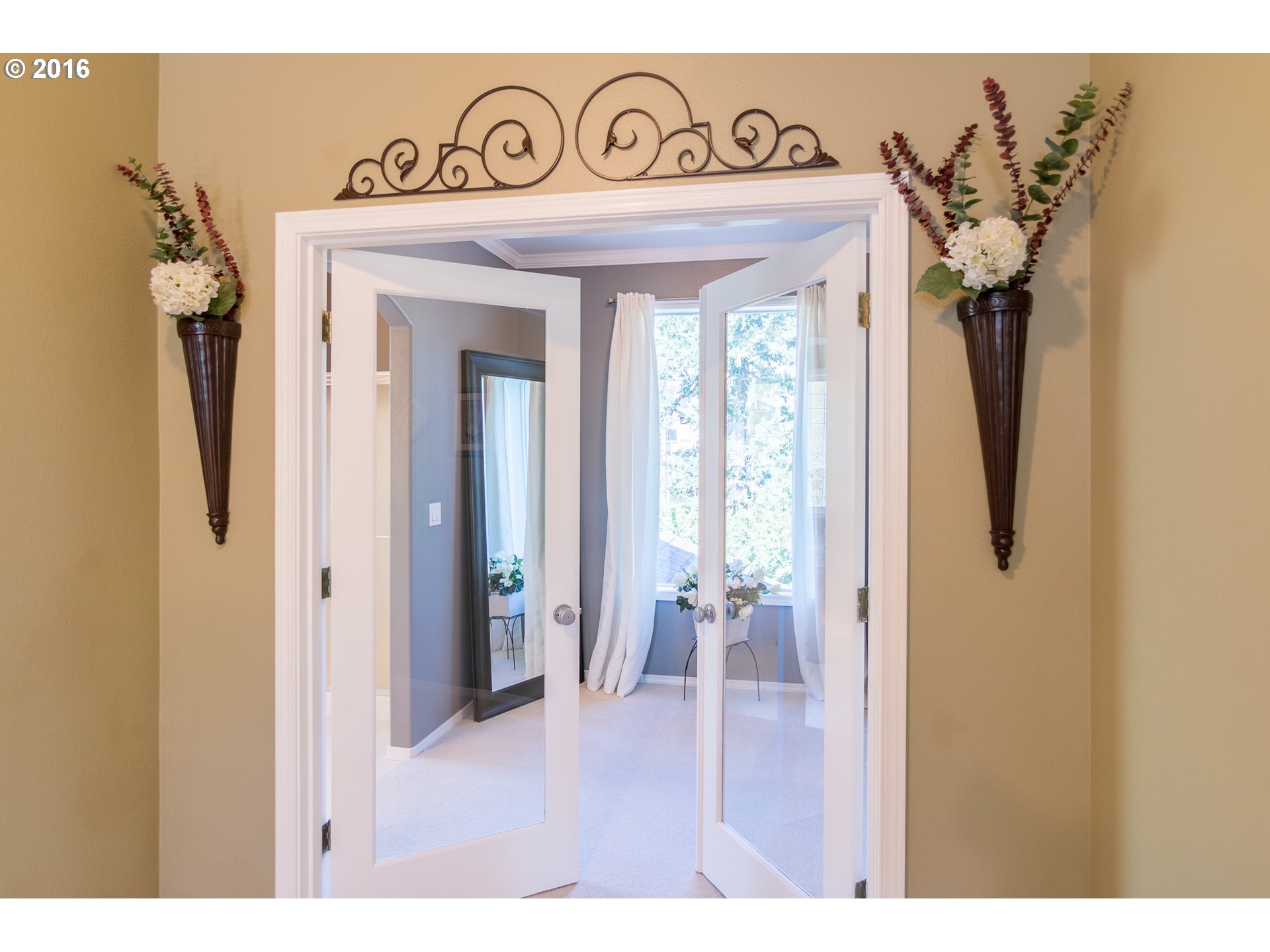 15806 Southwest Colyer Way Tigard, OR 97224 - Photo 19 of 32 a view of a entryway door