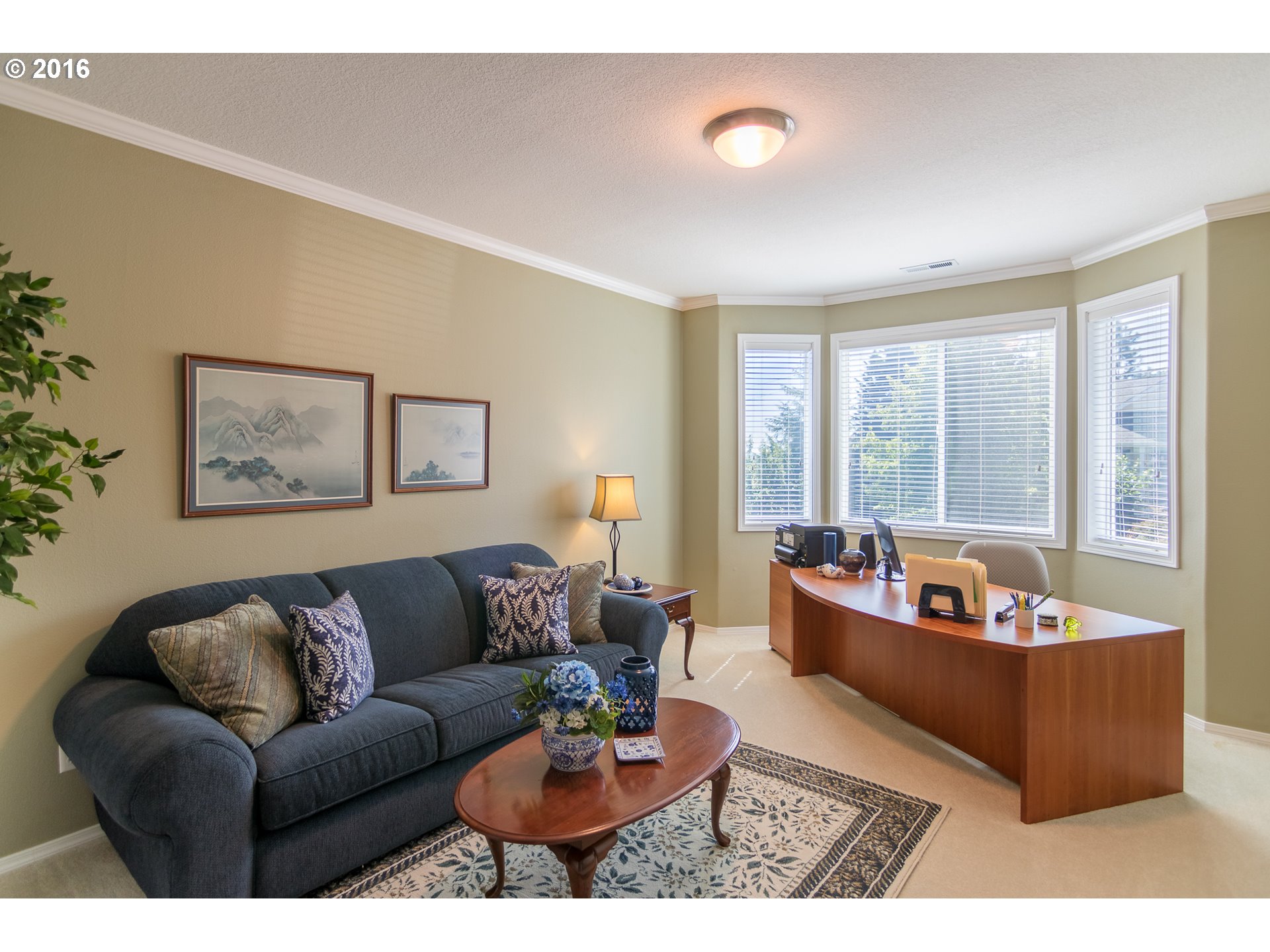 15806 Southwest Colyer Way Tigard, OR 97224 - Photo 26 of 32 a living room with furniture and a large window