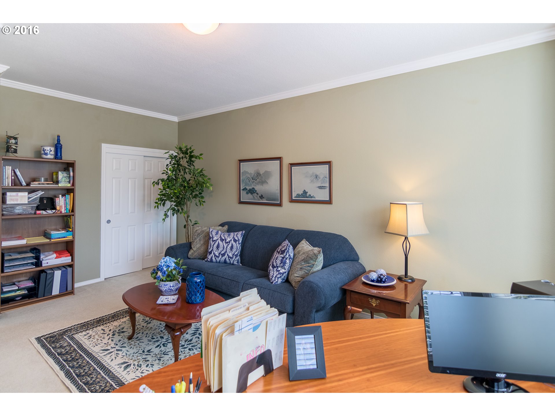 15806 Southwest Colyer Way Tigard, OR 97224 - Photo 27 of 32 a living room with furniture and a lamp