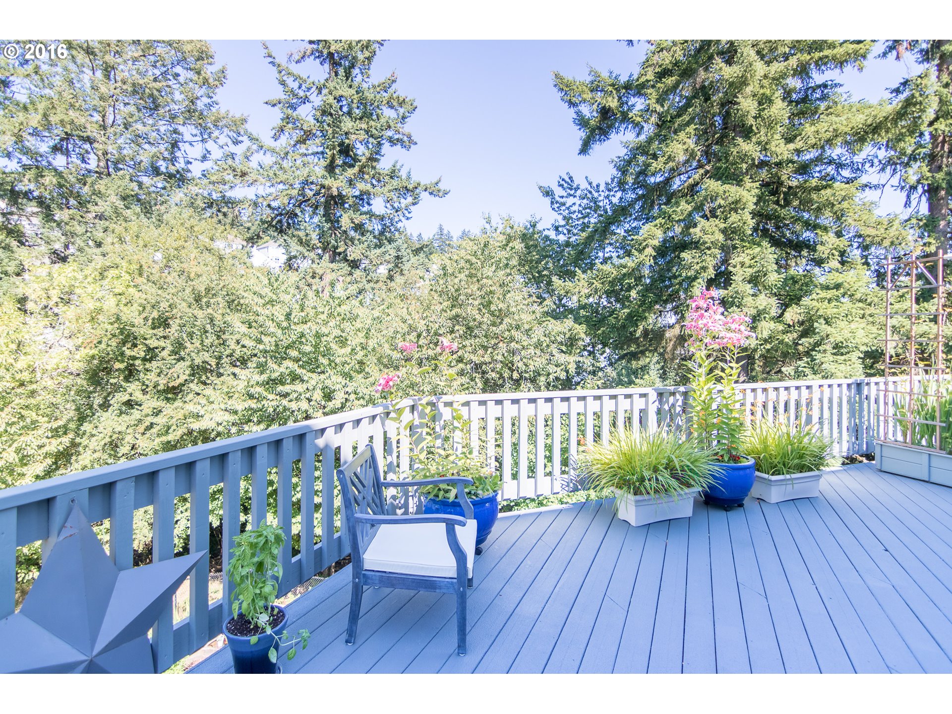 15806 Southwest Colyer Way Tigard, OR 97224 - Photo 29 of 32 a view of balcony with wooden floor and seating space