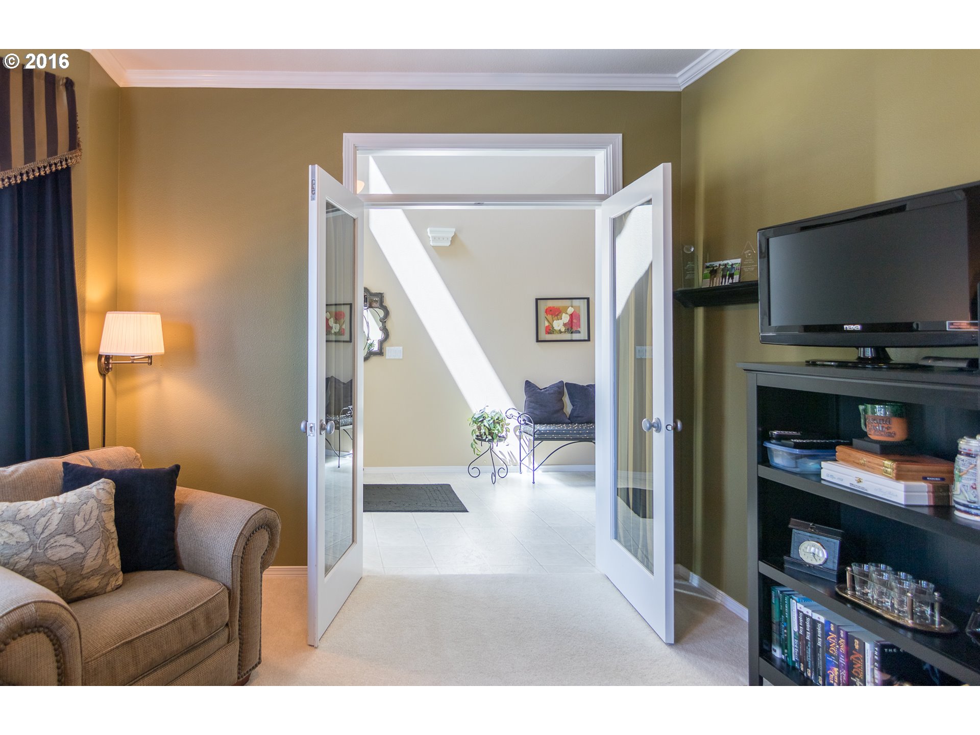15806 Southwest Colyer Way Tigard, OR 97224 - Photo 4 of 32 a living room with furniture and a flat screen tv