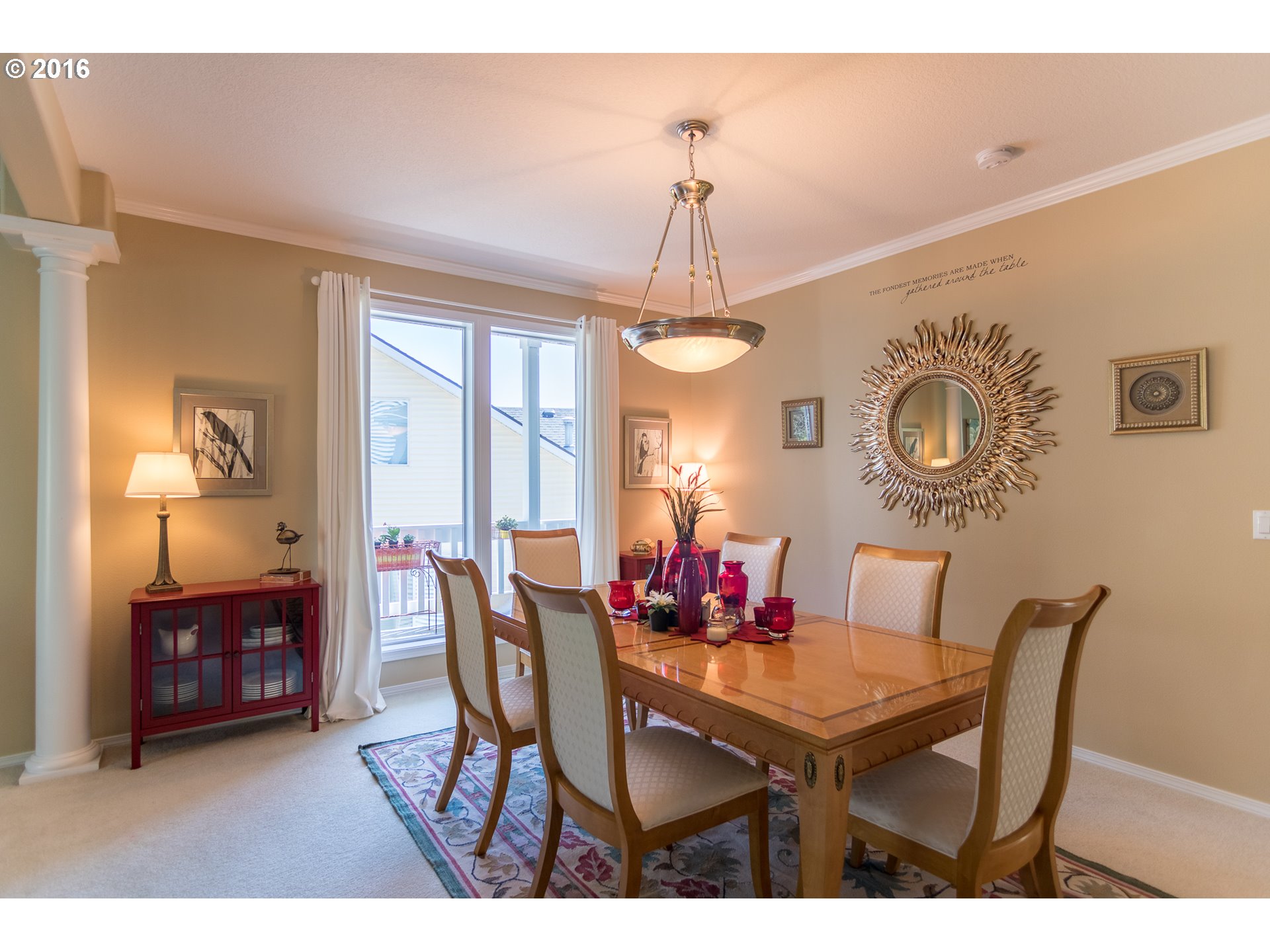 15806 Southwest Colyer Way Tigard, OR 97224 - Photo 5 of 32 a view of a dining room with furniture and chandelier