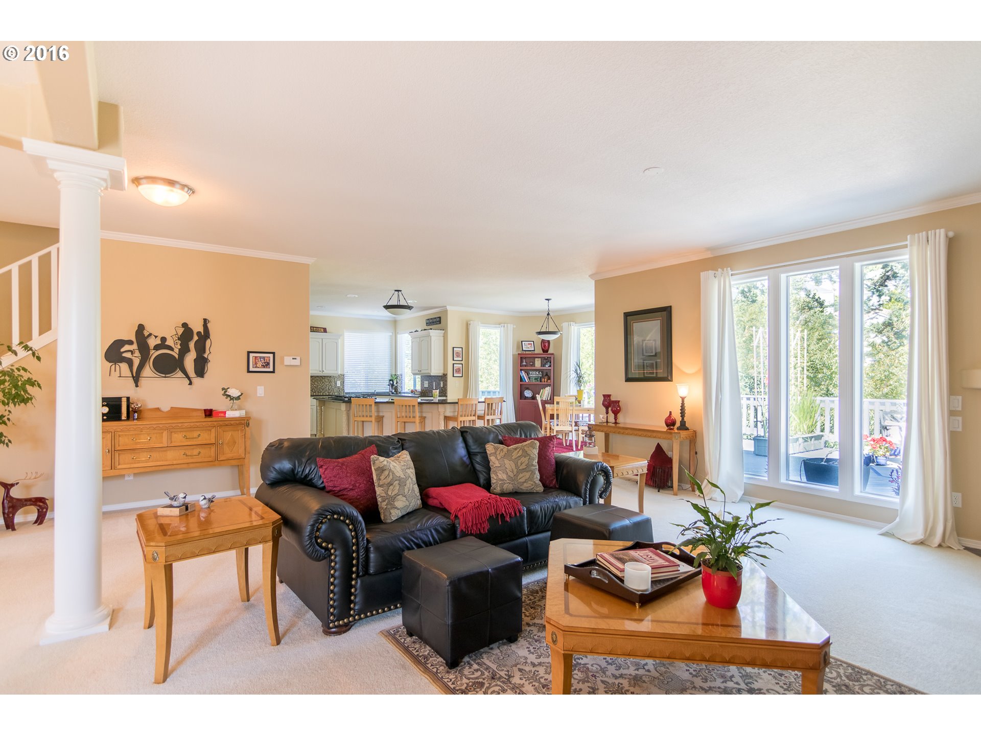 15806 Southwest Colyer Way Tigard, OR 97224 - Photo 7 of 32 a living room with furniture floor to ceiling window and a flat screen tv