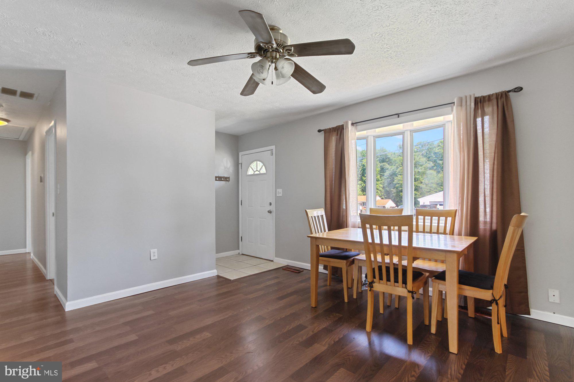 1817 Hanson Road Edgewood, MD 21040 - Photo 2 of 25 Dining Room with Bow Window and New Floors