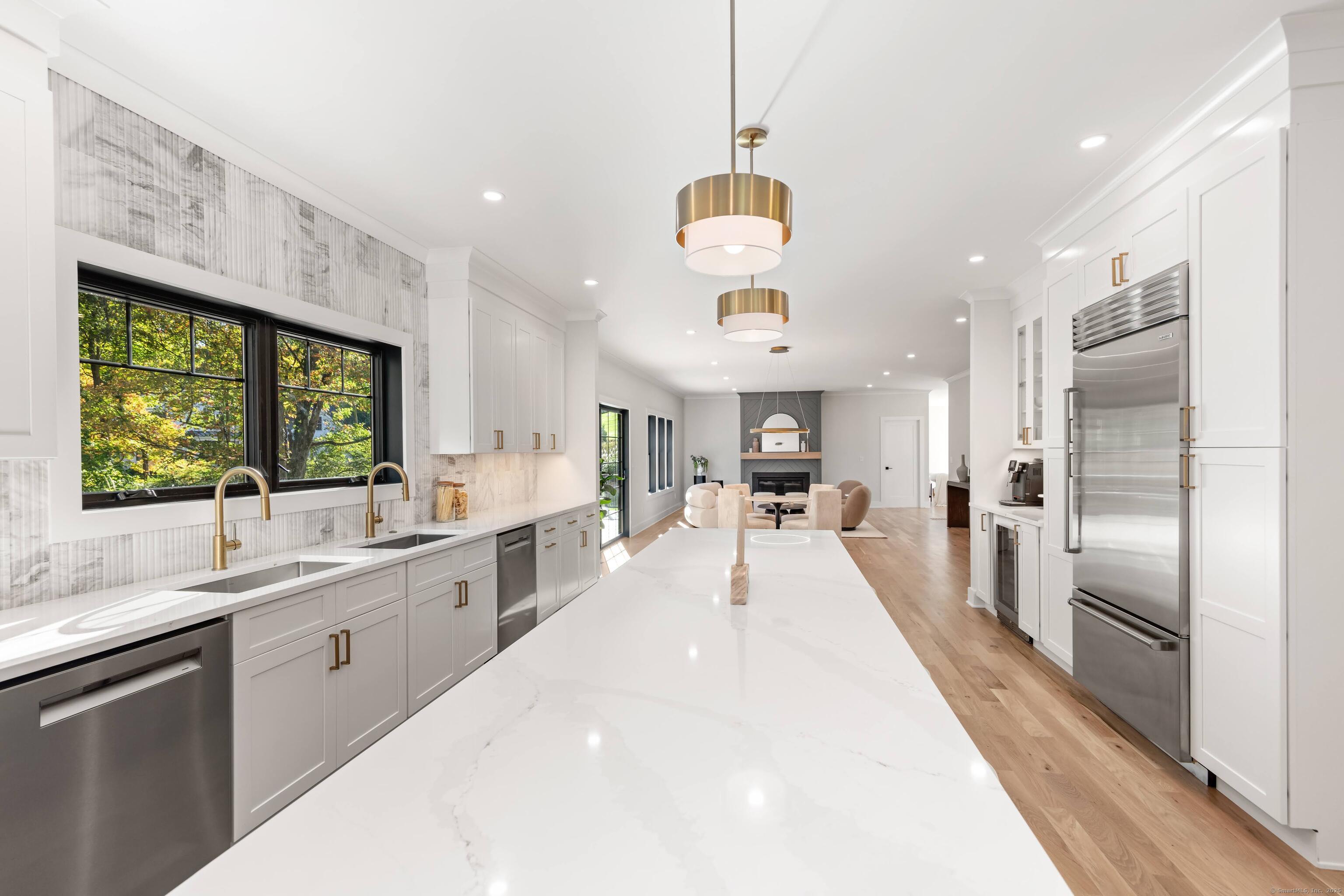 31 Gray Farms Road Stamford, CT 06905 - Photo 14 of 40 Ahhh, the heart of the home - enjoy the communication between kitchen and the hang-out family room.