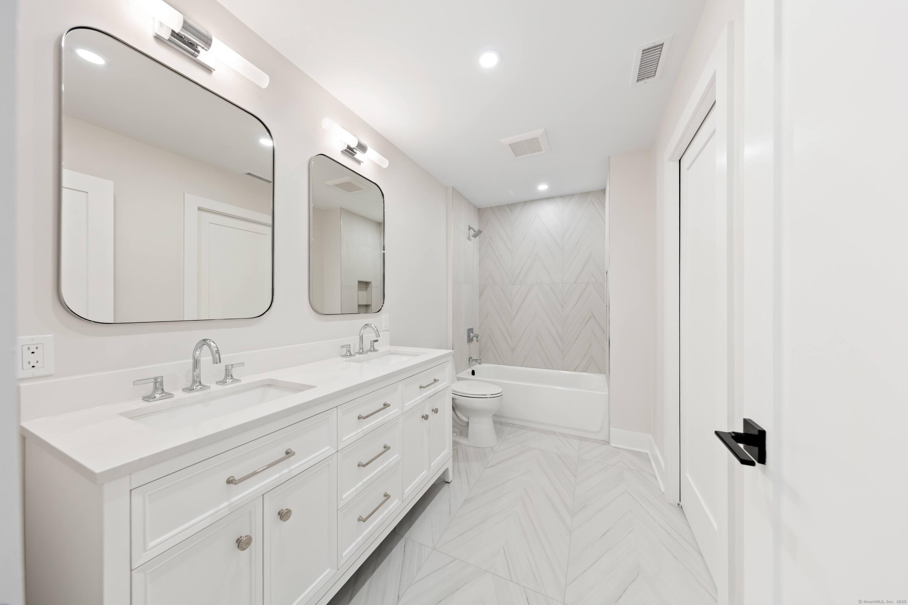 31 Gray Farms Road Stamford, CT 06905 - Photo 27 of 40 Bathroom 3 of 5.5. This bathroom serves as an ensuite to a bedroom and also provides hall access if needed.