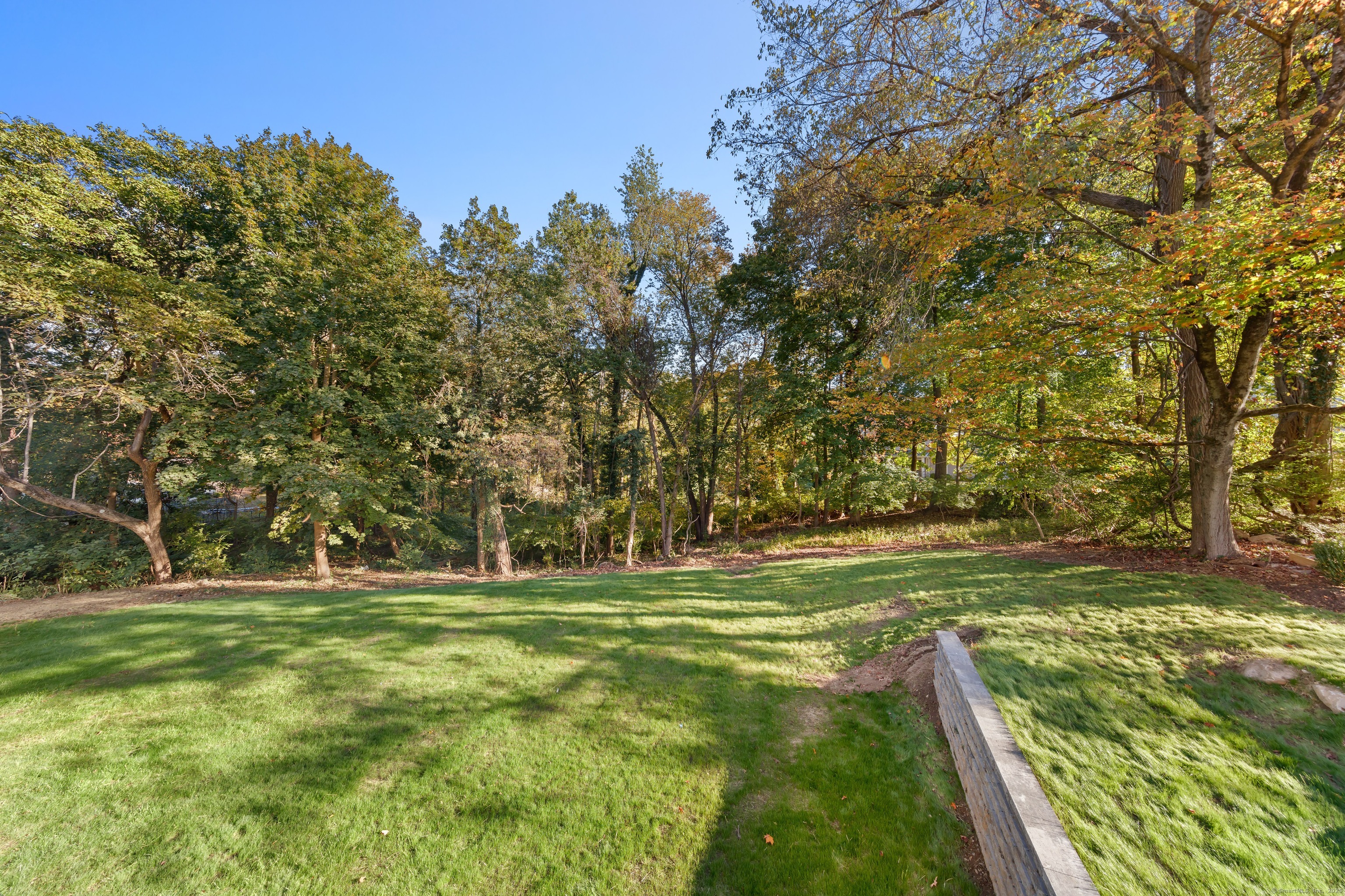 31 Gray Farms Road Stamford, CT 06905 - Photo 37 of 40 Backyard for hosting, having a catch, swingset or maybe a pool?