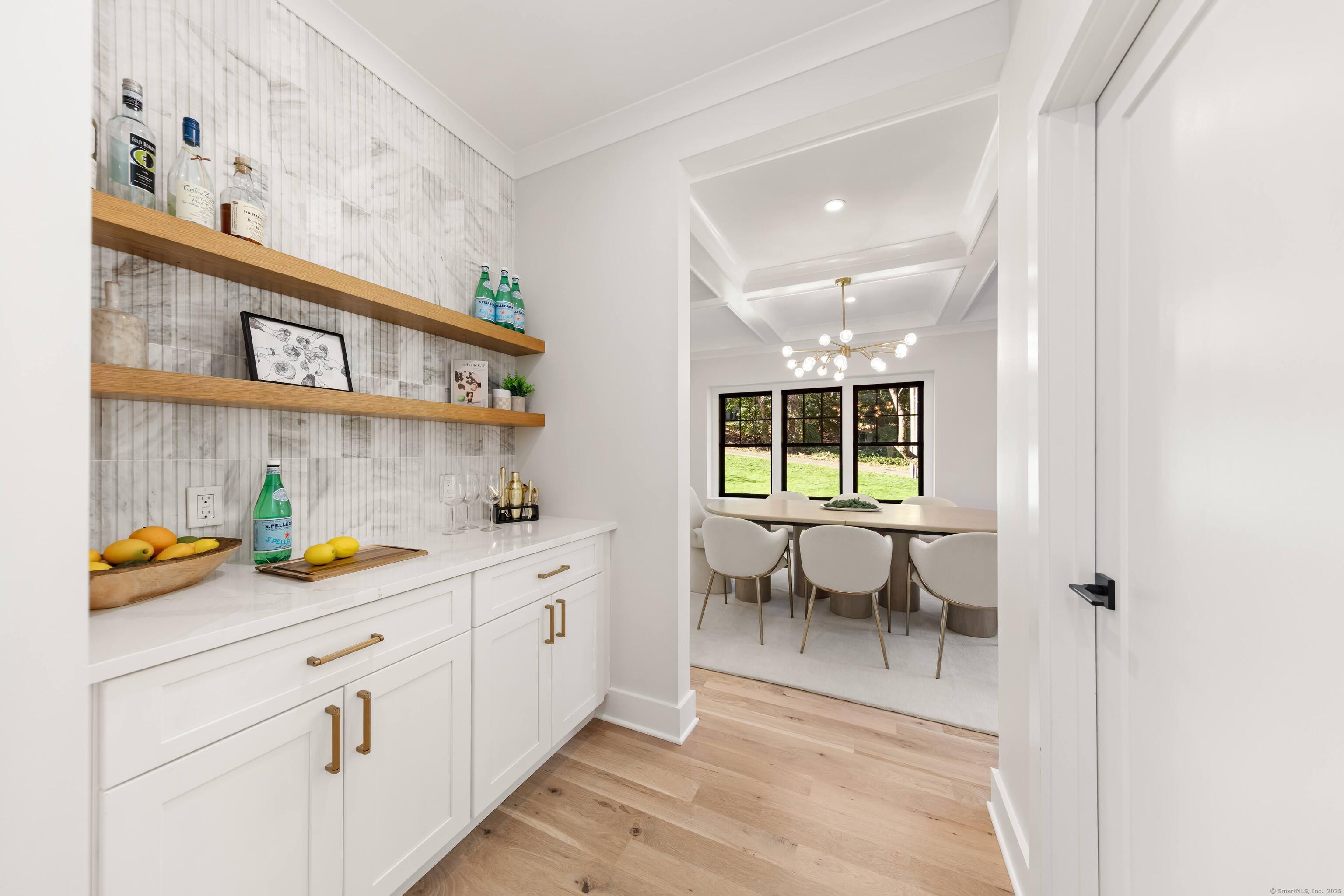 31 Gray Farms Road Stamford, CT 06905 - Photo 10 of 40 Butler's Pantry - perfect for entertaining and bringing food & drinks when hosting (+ walk-in pantry through closed door)
