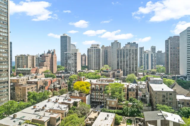 a view of a city with tall buildings