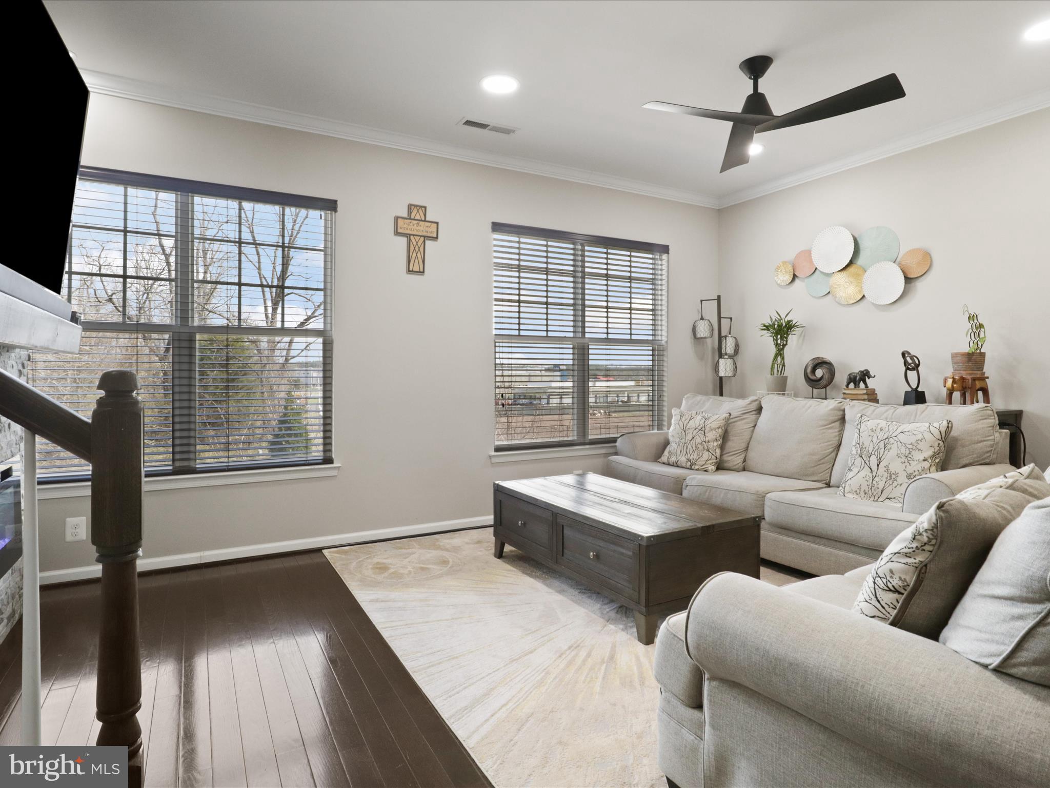 44021 Eastgate View Drive Chantilly, VA 20152 - Photo 14 of 30 a living room with furniture and a flat screen tv