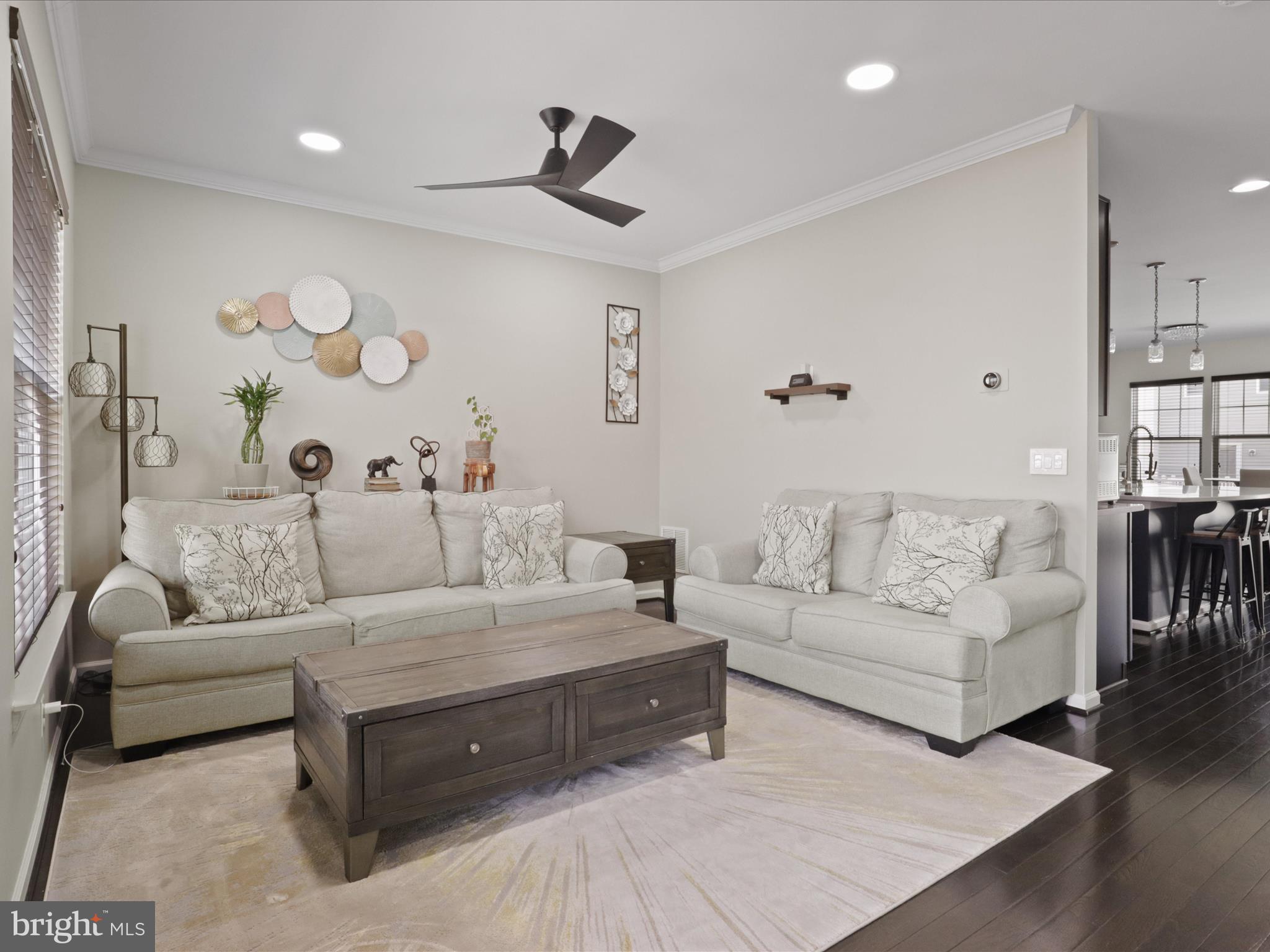 44021 Eastgate View Drive Chantilly, VA 20152 - Photo 15 of 30 a living room with furniture and a chandelier