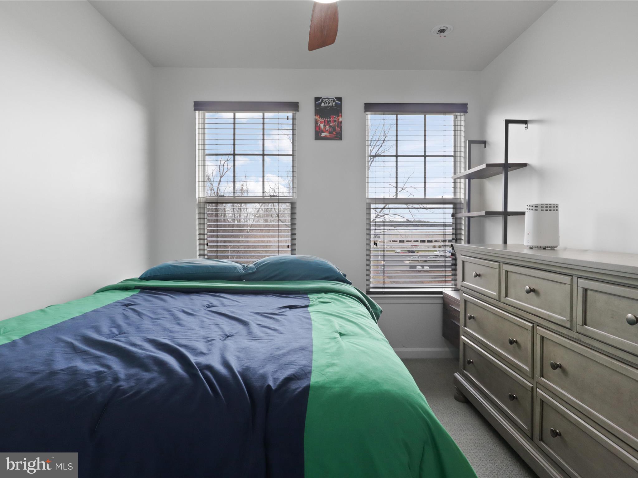 44021 Eastgate View Drive Chantilly, VA 20152 - Photo 21 of 30 a bedroom with a bed and a window