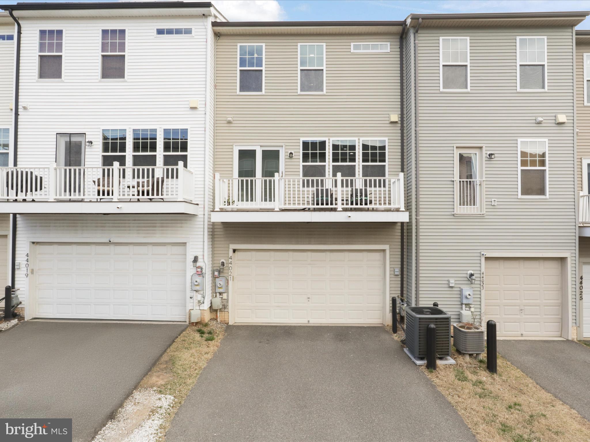 44021 Eastgate View Drive Chantilly, VA 20152 - Photo 26 of 30 a front view of a building with a lot of windows