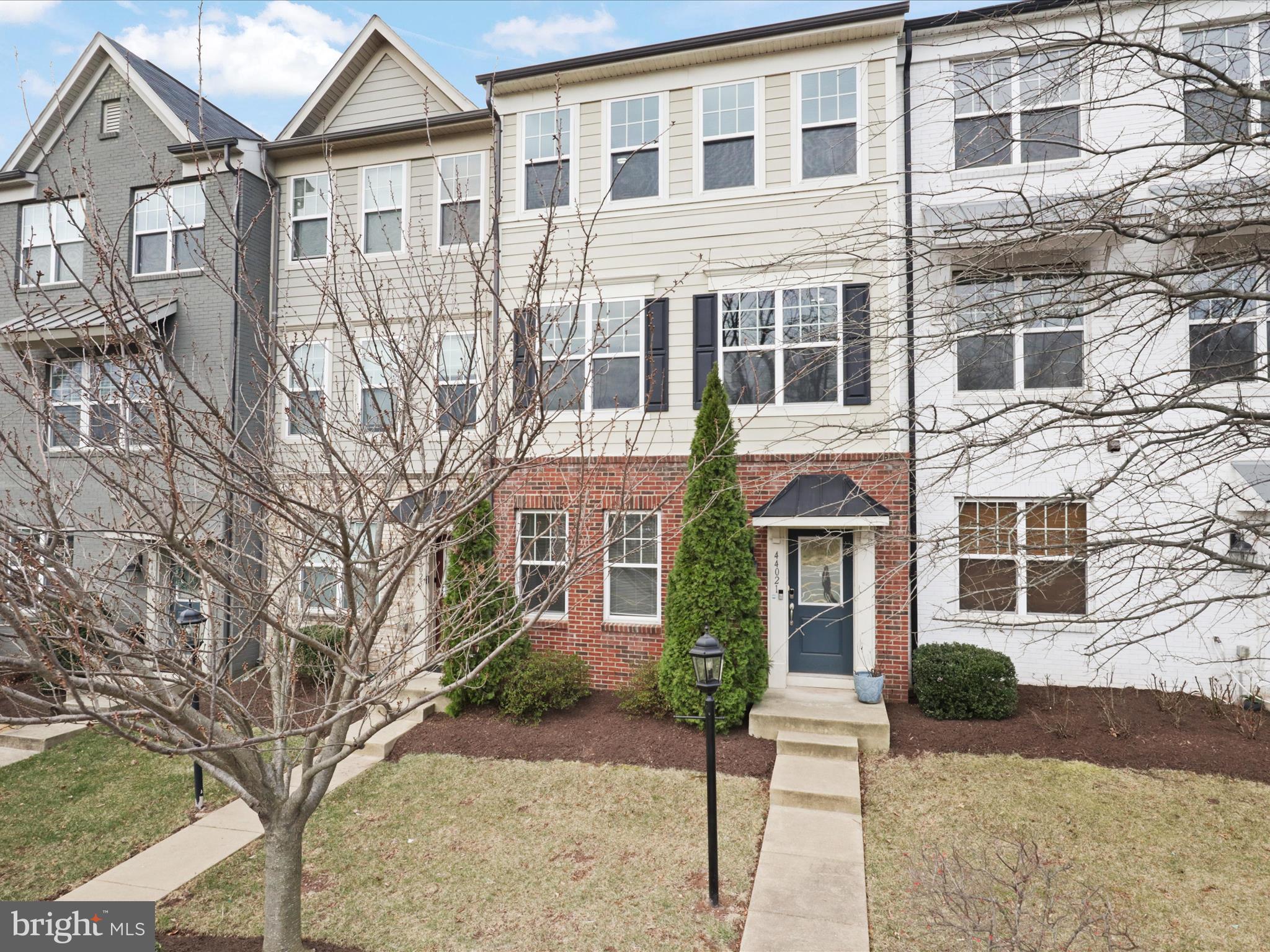 44021 Eastgate View Drive Chantilly, VA 20152 - Photo 3 of 30 front view of a house with a yard