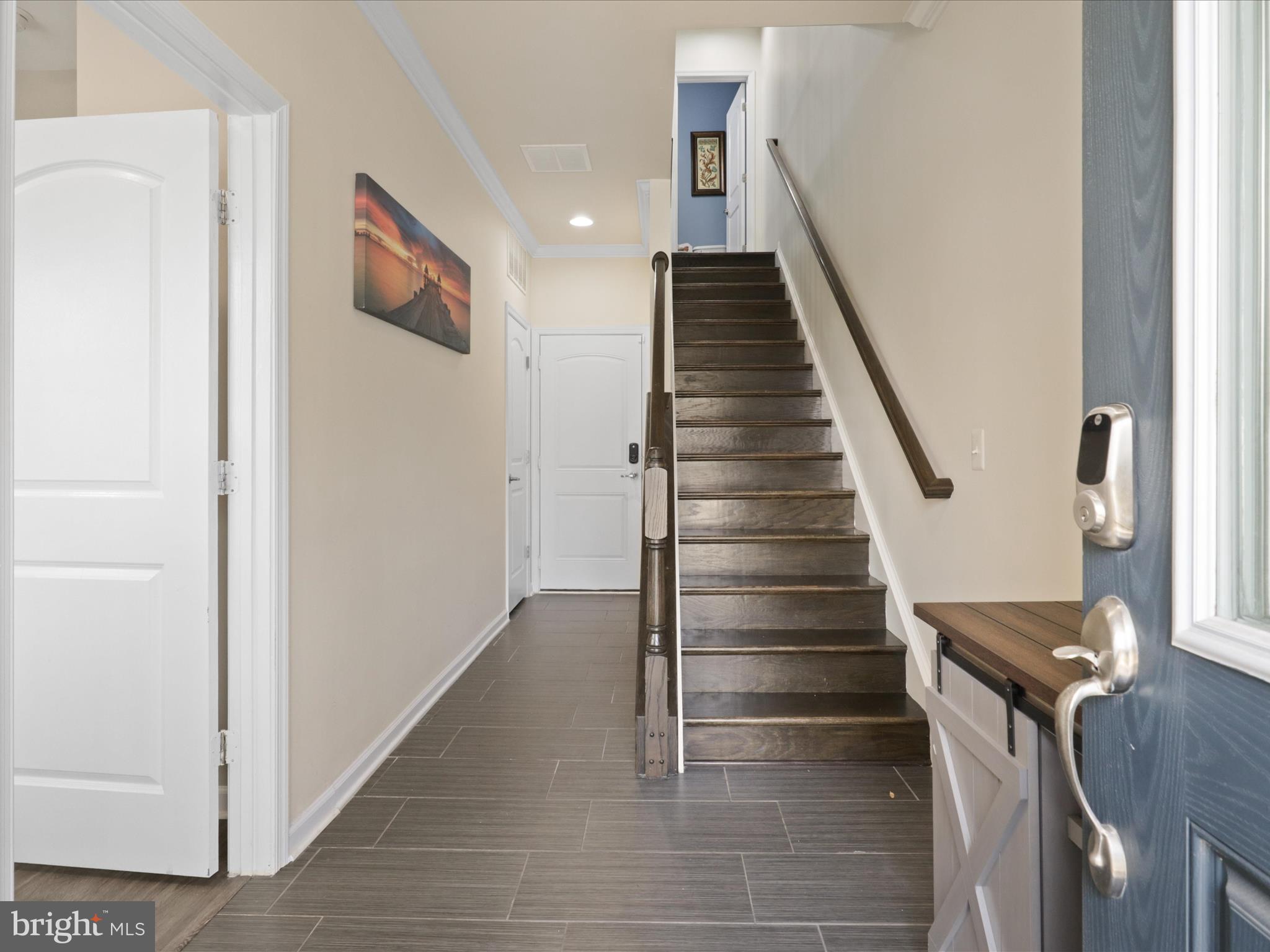 44021 Eastgate View Drive Chantilly, VA 20152 - Photo 4 of 30 a view of entryway and hall with wooden floor
