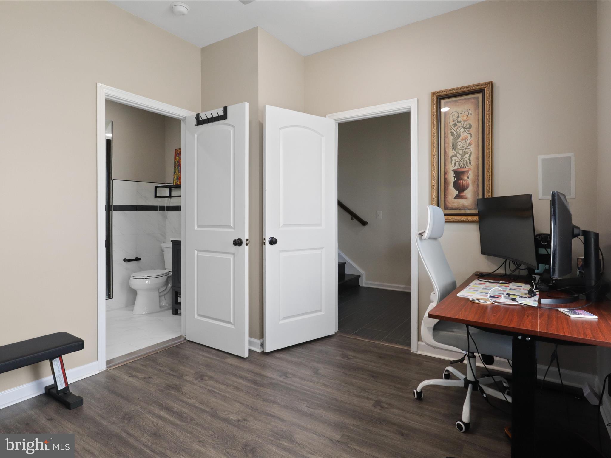 44021 Eastgate View Drive Chantilly, VA 20152 - Photo 6 of 30 a view of a workspace with furniture and wooden floor