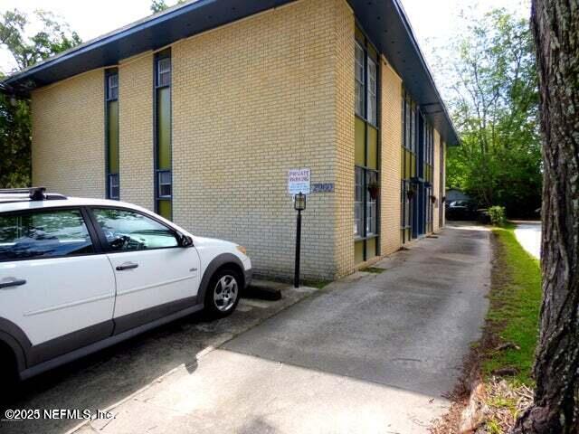 2960 Remington Street, Unit 2 Jacksonville, FL 32205 - Photo 2 of 14 a car parked in front of a house