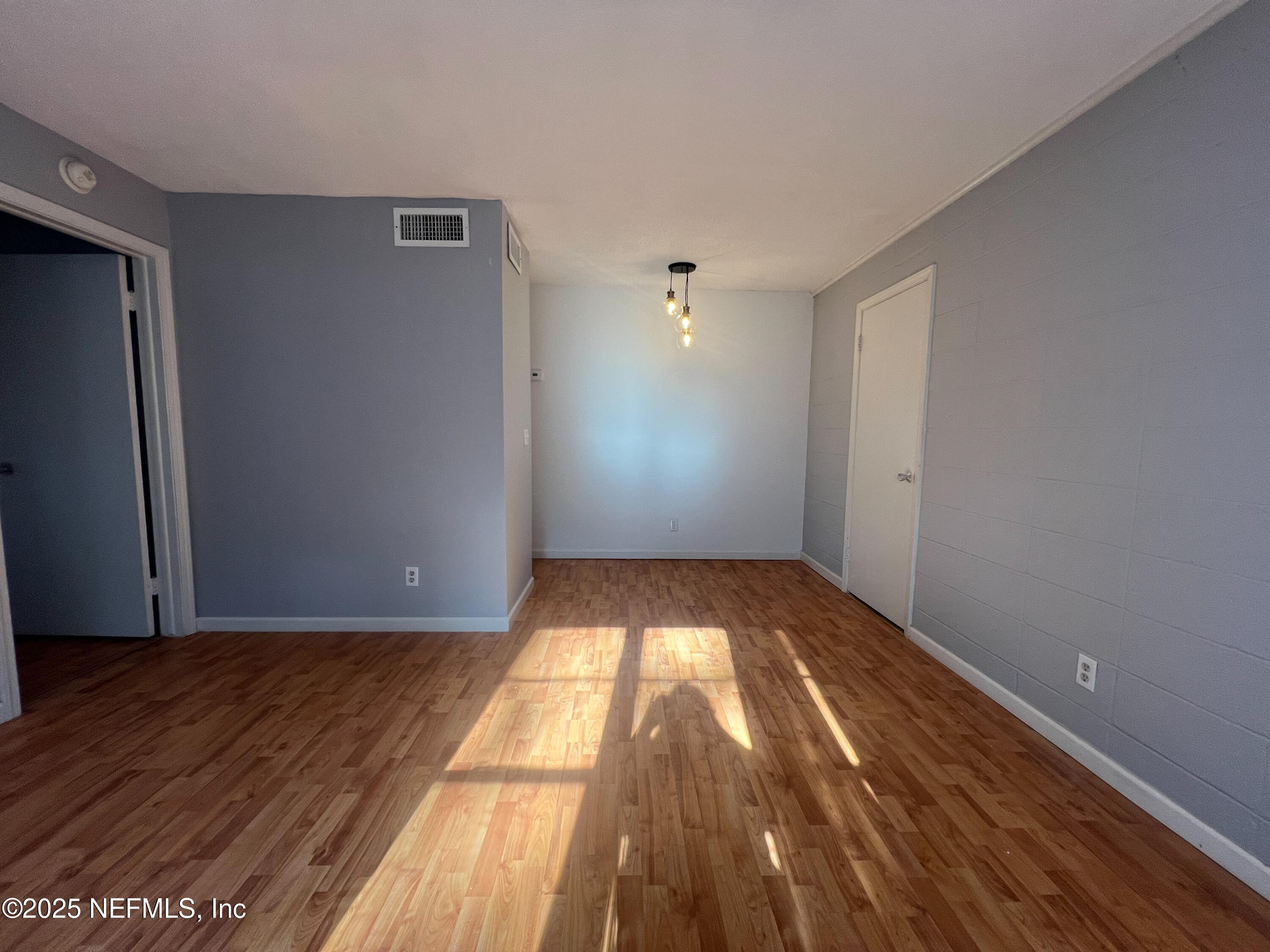 2960 Remington Street, Unit 2 Jacksonville, FL 32205 - Photo 4 of 14 a view of empty room with wooden floor