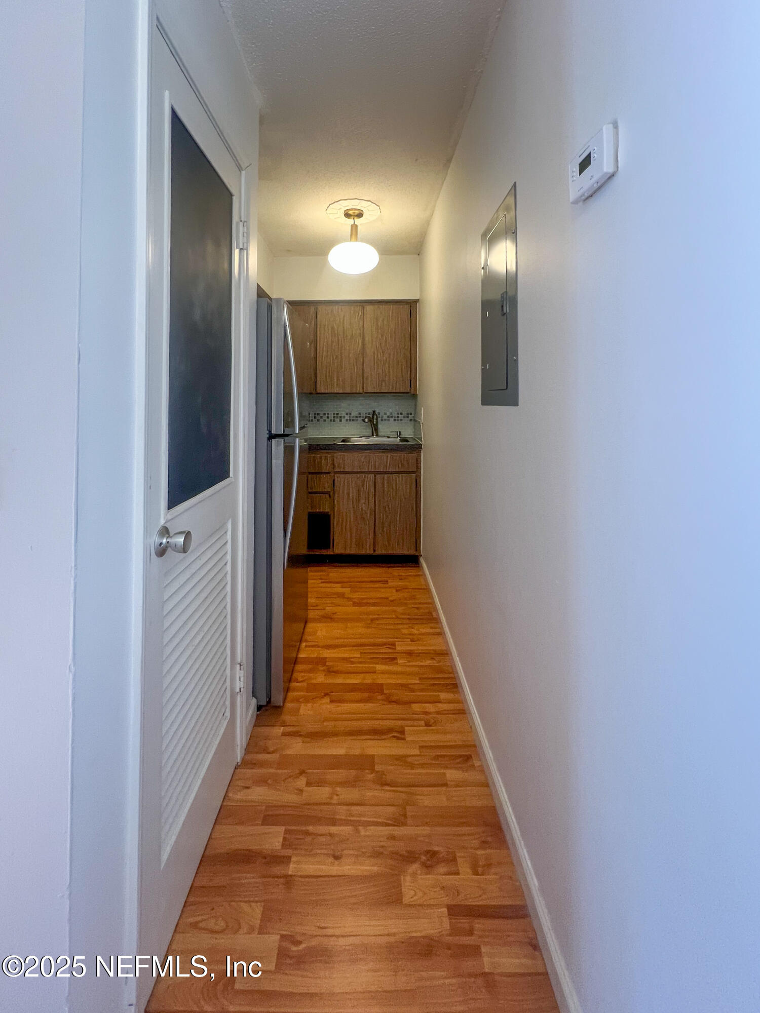 2960 Remington Street, Unit 2 Jacksonville, FL 32205 - Photo 6 of 14 a view of a hallway with wooden floor