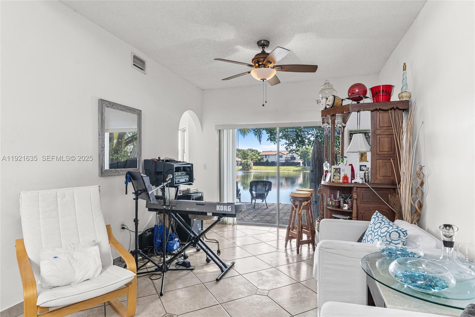 4687 Southwest 153rd Court Miami, FL 33185 - Photo 12 of 40 a living room with furniture and a window