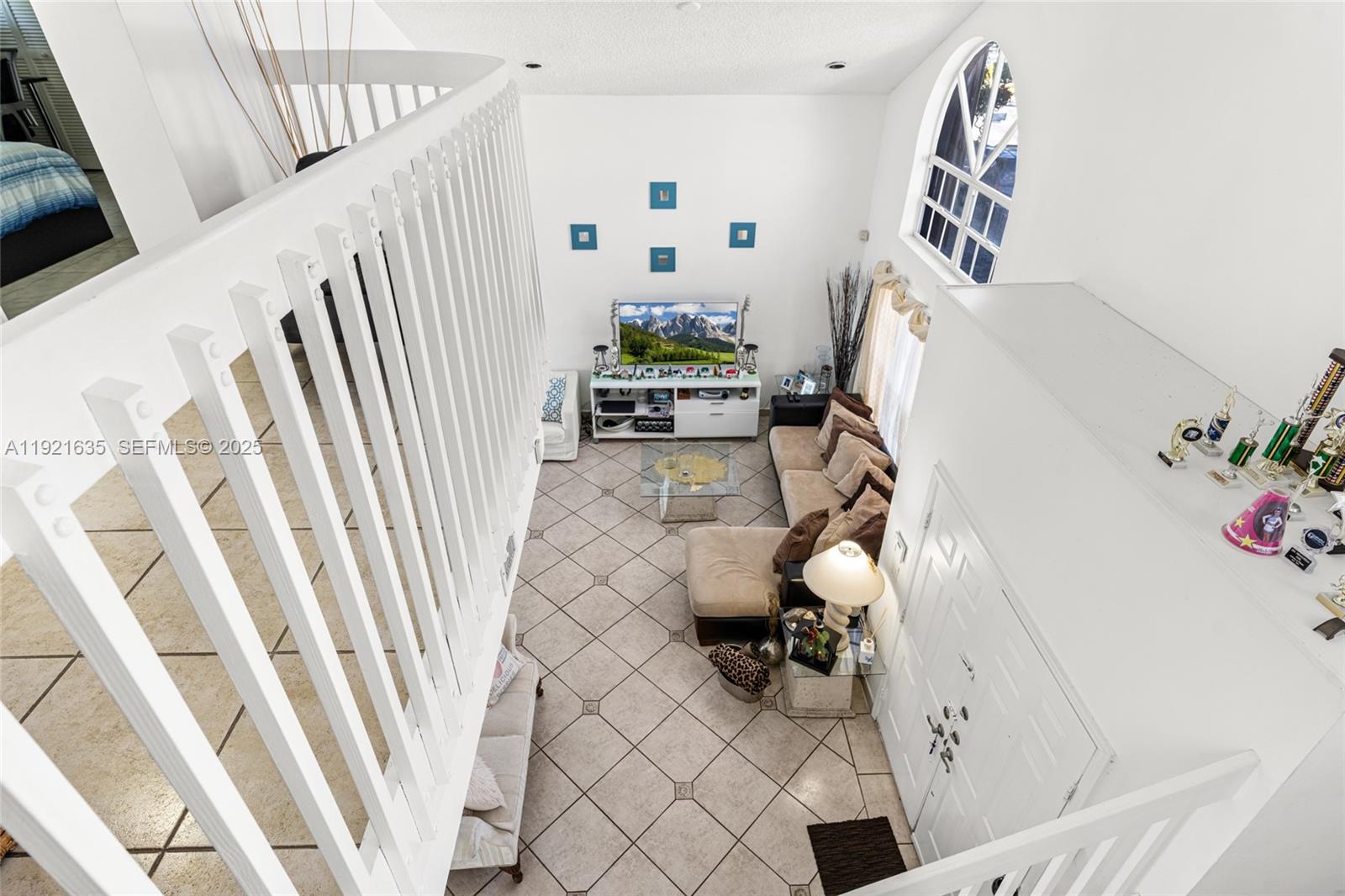 4687 Southwest 153rd Court Miami, FL 33185 - Photo 21 of 40 a living room with furniture and wooden floor