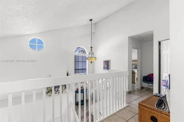 a bathroom with a sink a mirror and a shower
