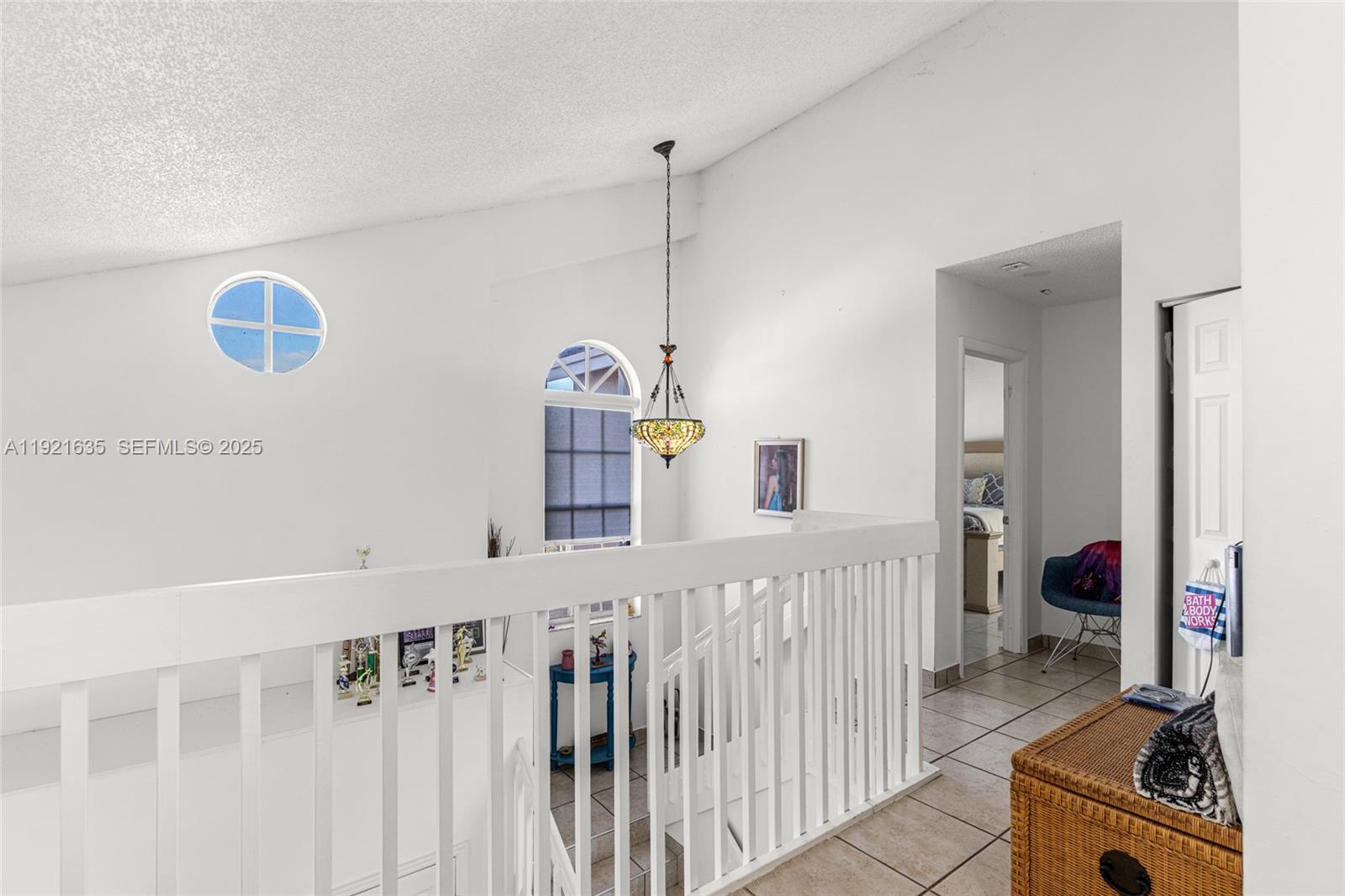4687 Southwest 153rd Court Miami, FL 33185 - Photo 26 of 40 a bathroom with a sink a mirror and a shower