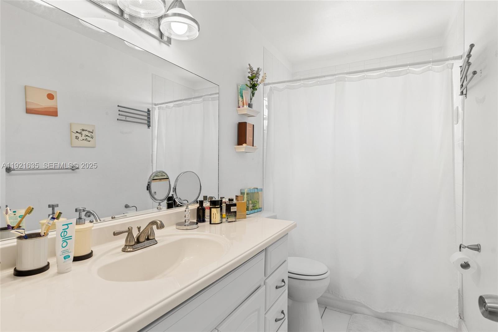 4687 Southwest 153rd Court Miami, FL 33185 - Photo 29 of 40 a bathroom with a sink toilet and shower