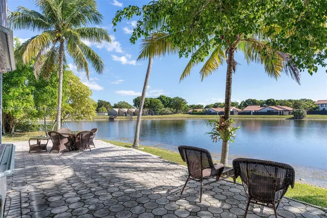 a lake view with a garden
