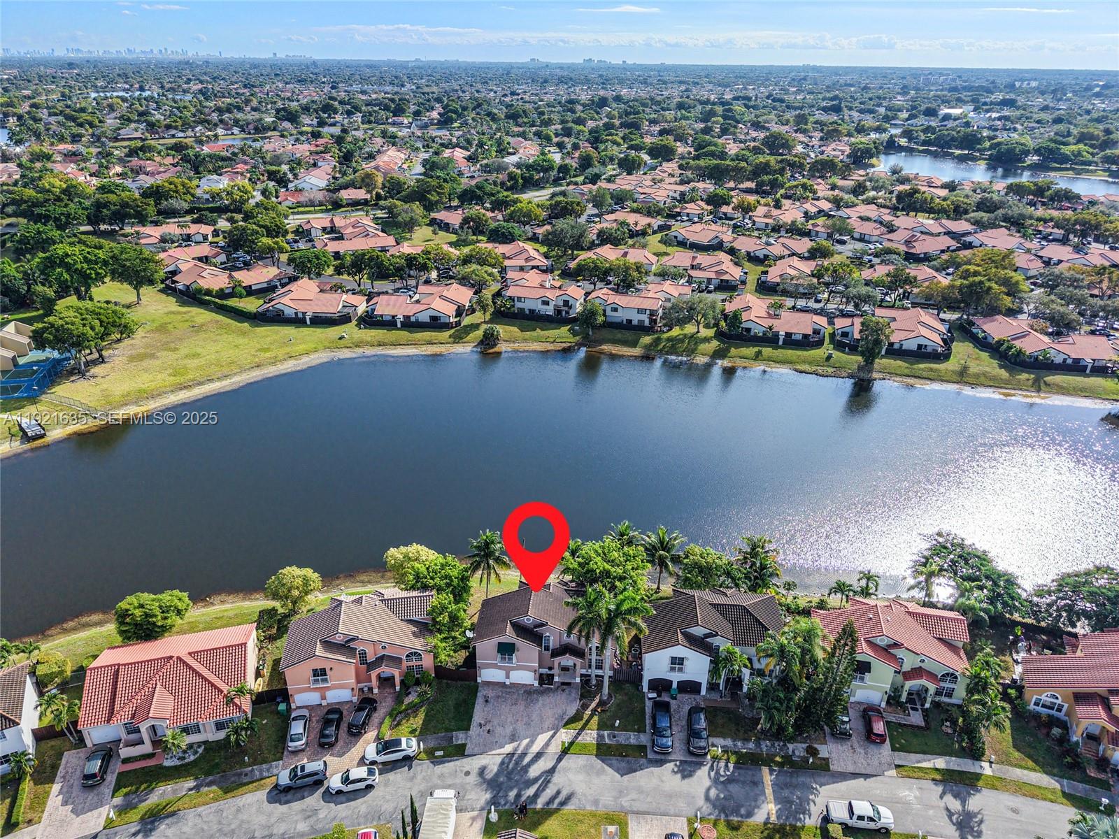 4687 Southwest 153rd Court Miami, FL 33185 - Photo 39 of 40 an aerial view of lake and residential houses with outdoor space