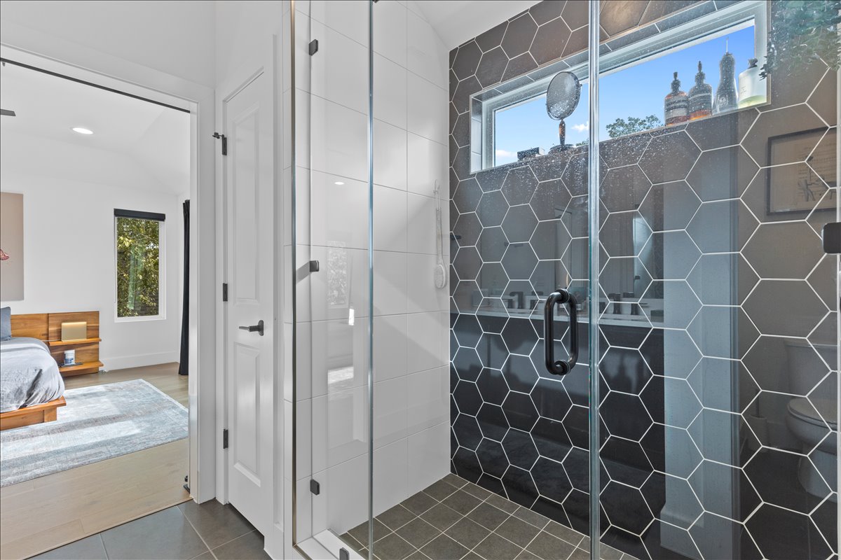 4201 Clawson Road Austin, TX 78704 - Photo 15 of 25 a bathroom with a shower and a sink