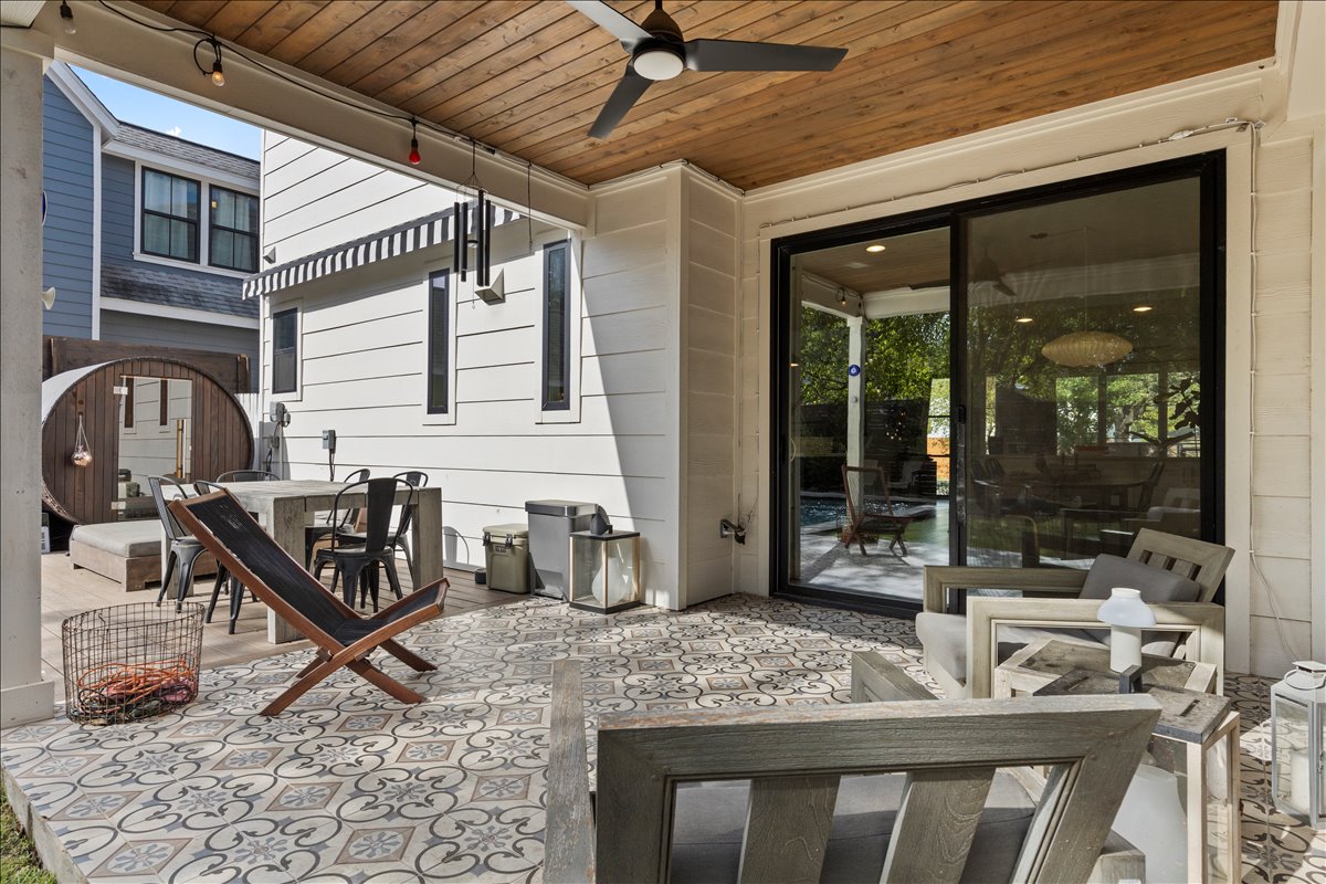 4201 Clawson Road Austin, TX 78704 - Photo 2 of 25 a backyard of a house with fountain table and chairs