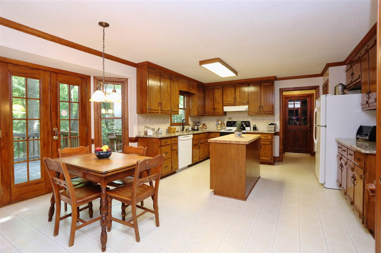 2908 Legare Court Raleigh, NC 27613 - Photo 6 of 25 Breakfast Area to Kitchen
