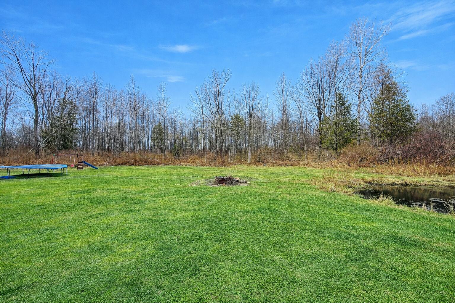 168 Corinth Road Garland, ME 04939 - Photo 2 of 26 Playground by the forest clearing