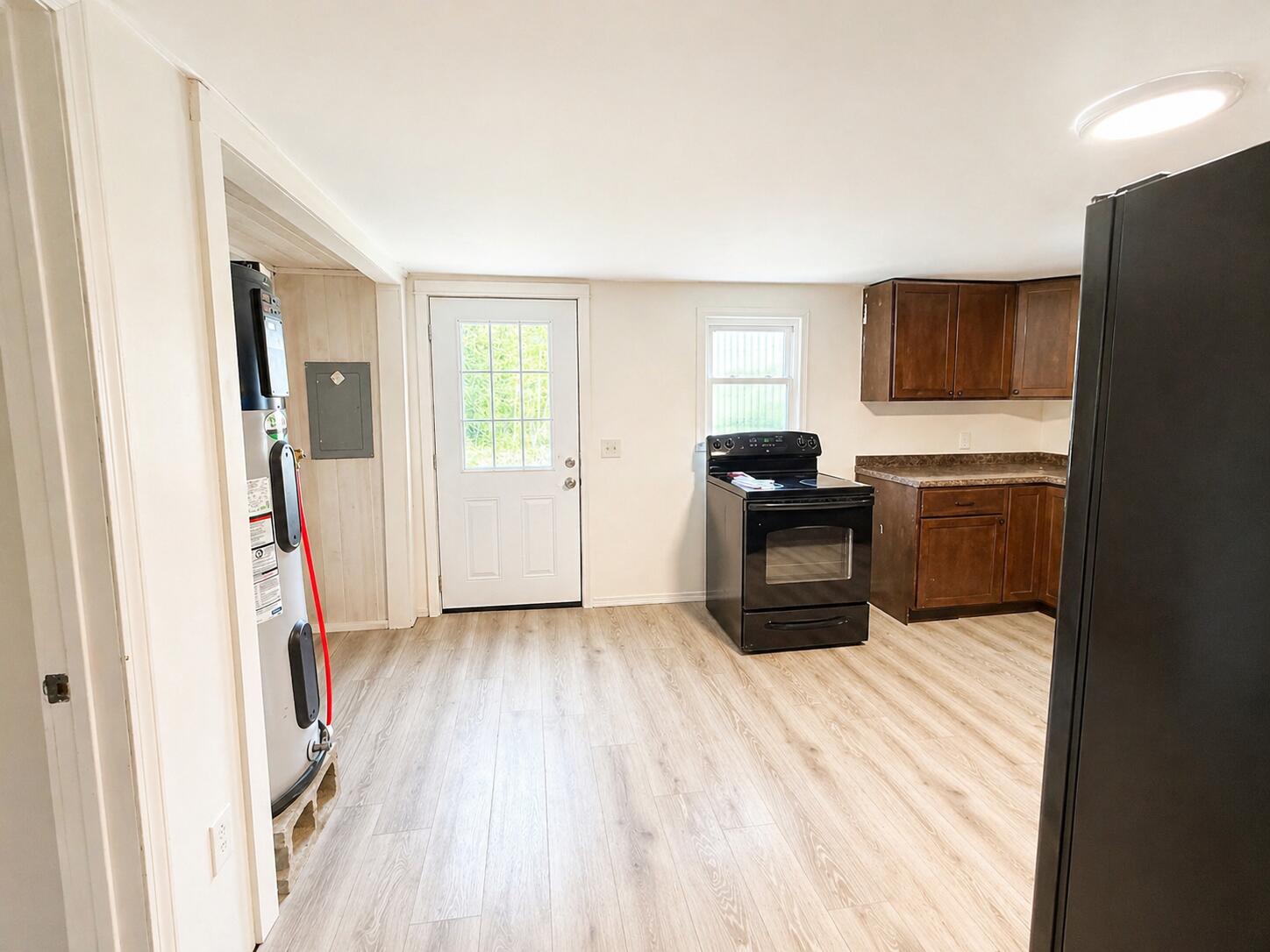 168 Corinth Road Garland, ME 04939 - Photo 7 of 26 Entry door and kitchen