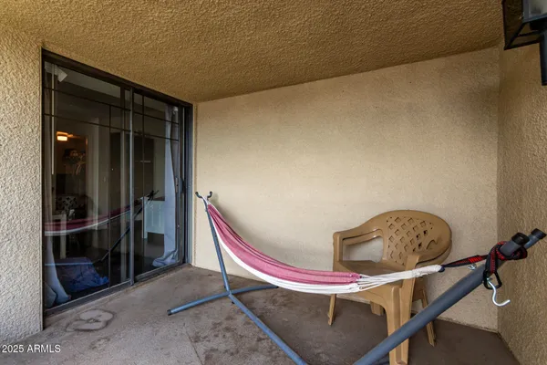 a room with a table and chairs