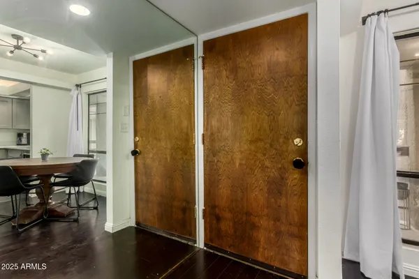 a view of a bathroom with a glass door and shower
