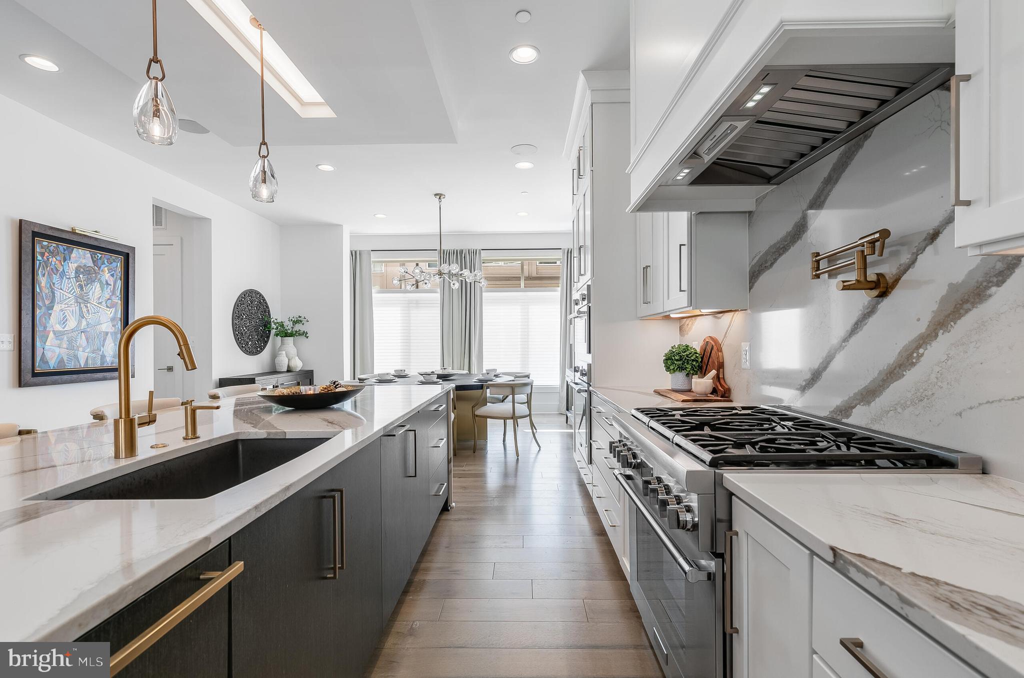 8201 River Road Bethesda, MD 20817 - Photo 11 of 50 a kitchen with lots of counter top space and stove