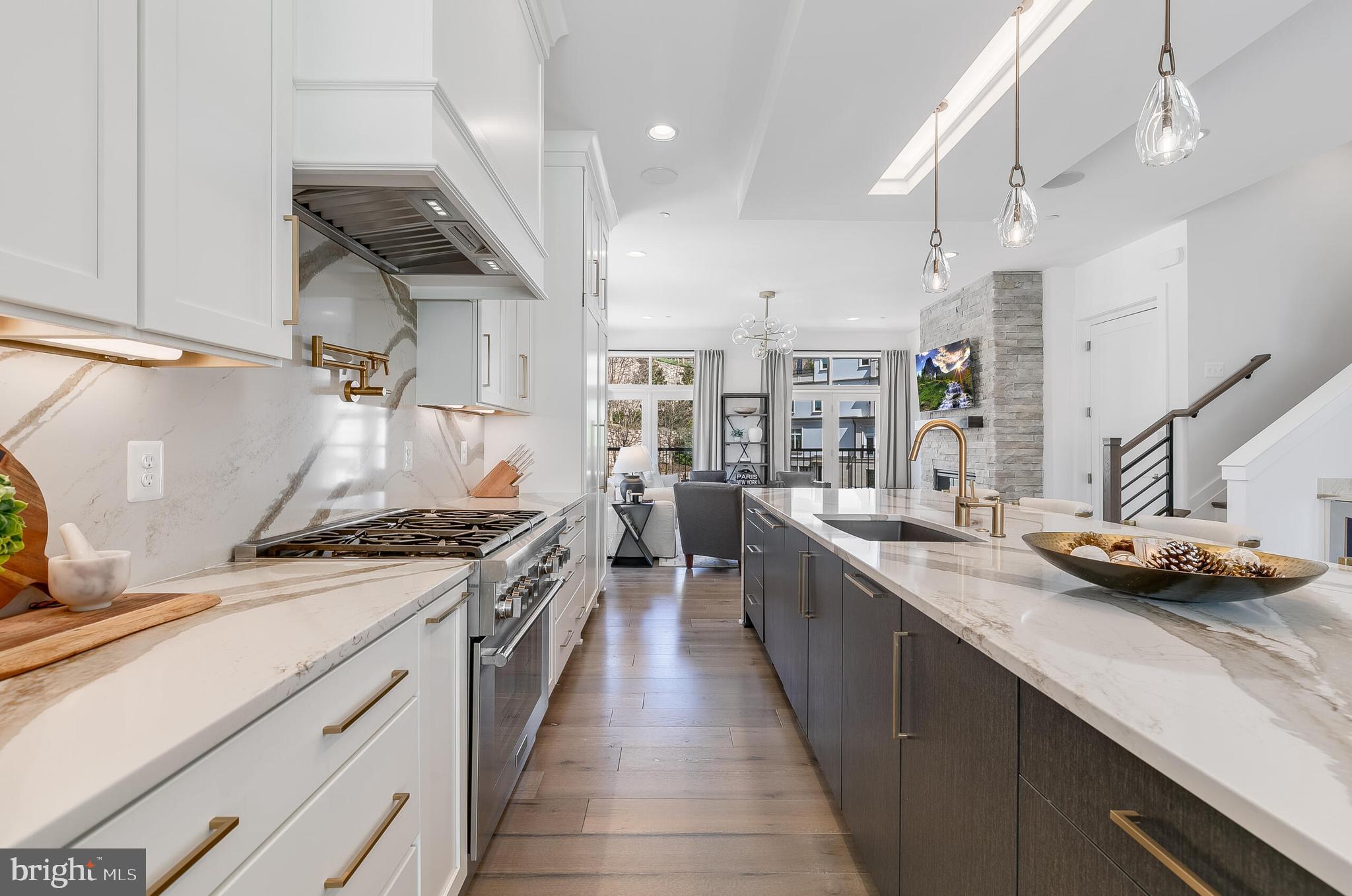 8201 River Road Bethesda, MD 20817 - Photo 12 of 50 a kitchen with a stove and a sink