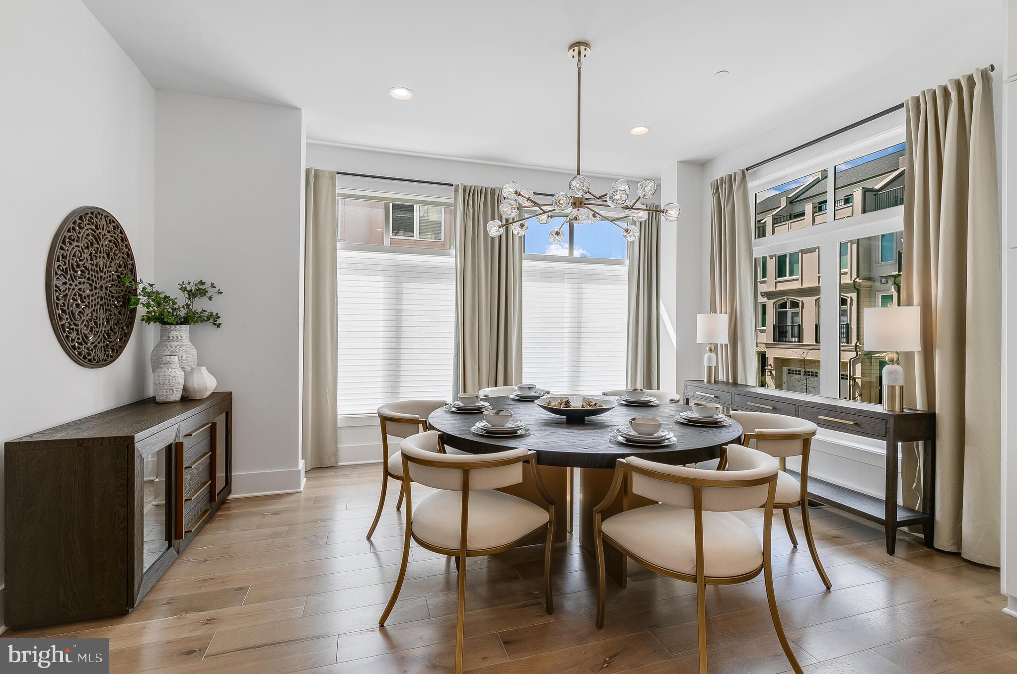 8201 River Road Bethesda, MD 20817 - Photo 14 of 50 a view of a dining room with furniture window and wooden floor